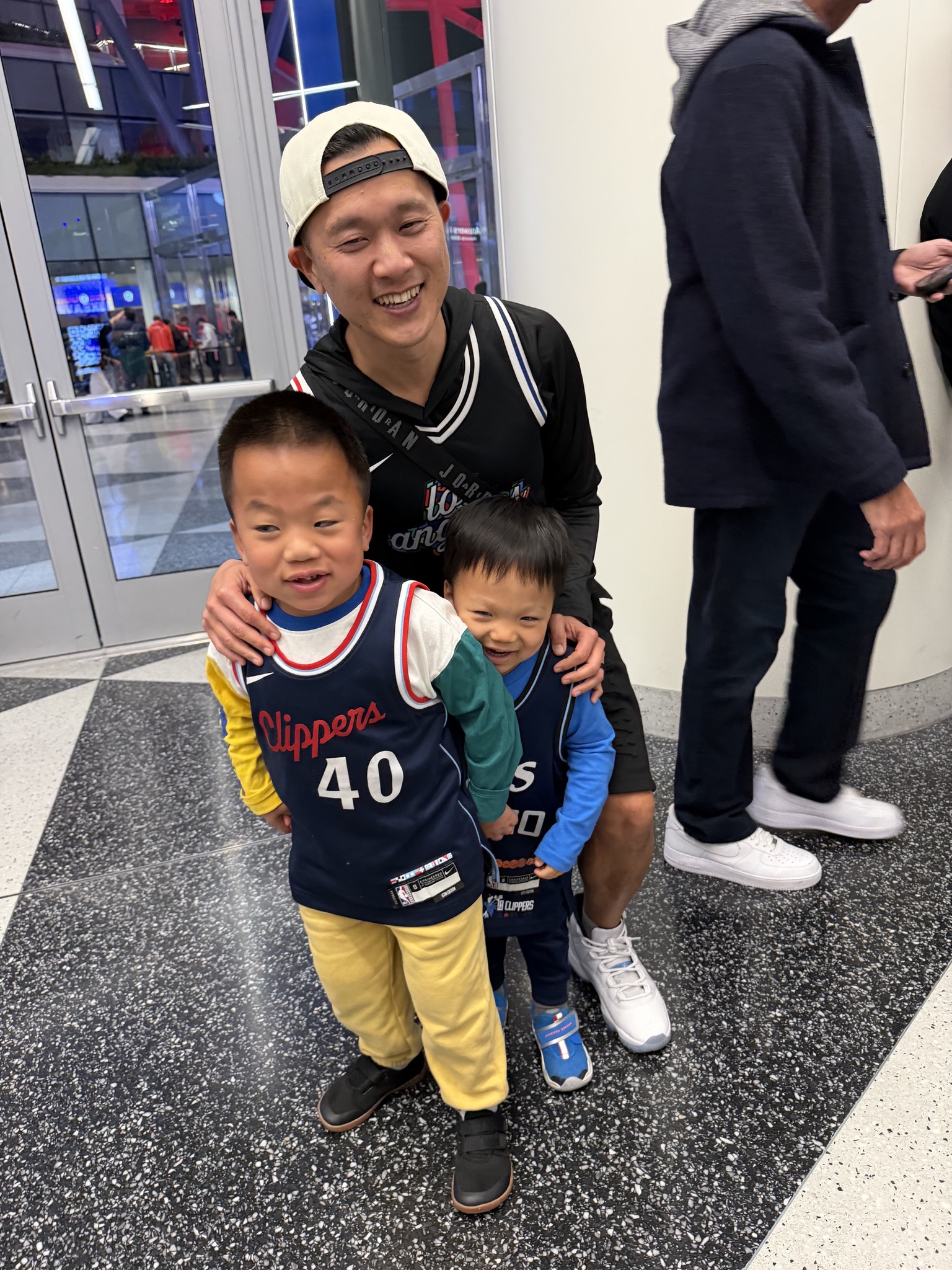 Peter with Skyler and Ollie at a Clippers game