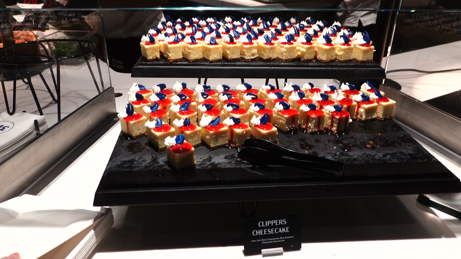 Red, white, and blue Clippers cheesecake bites on the dessert display in the North Red Lounge