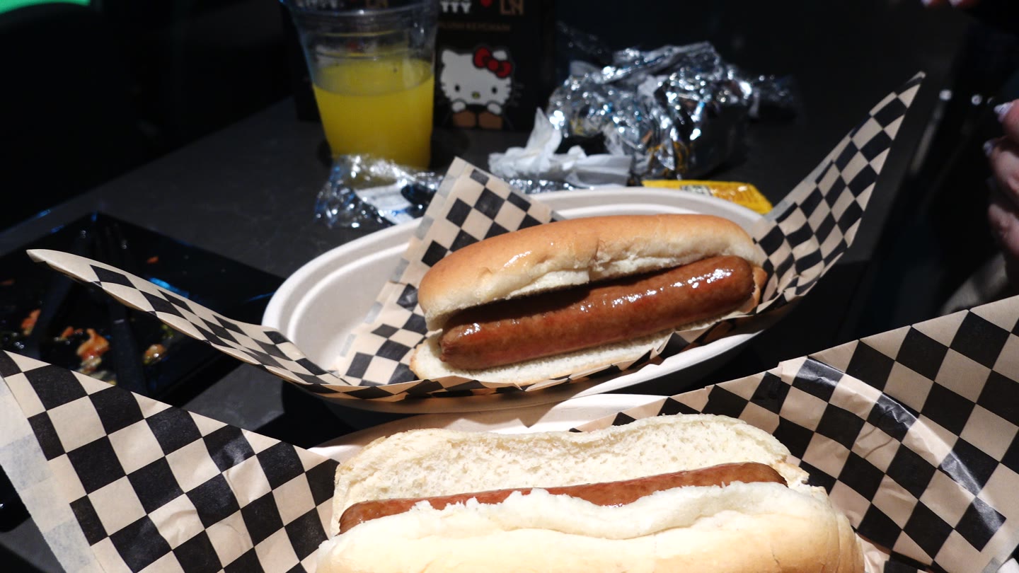 A hot dog from the Founders Club grill, eaten at our seats.