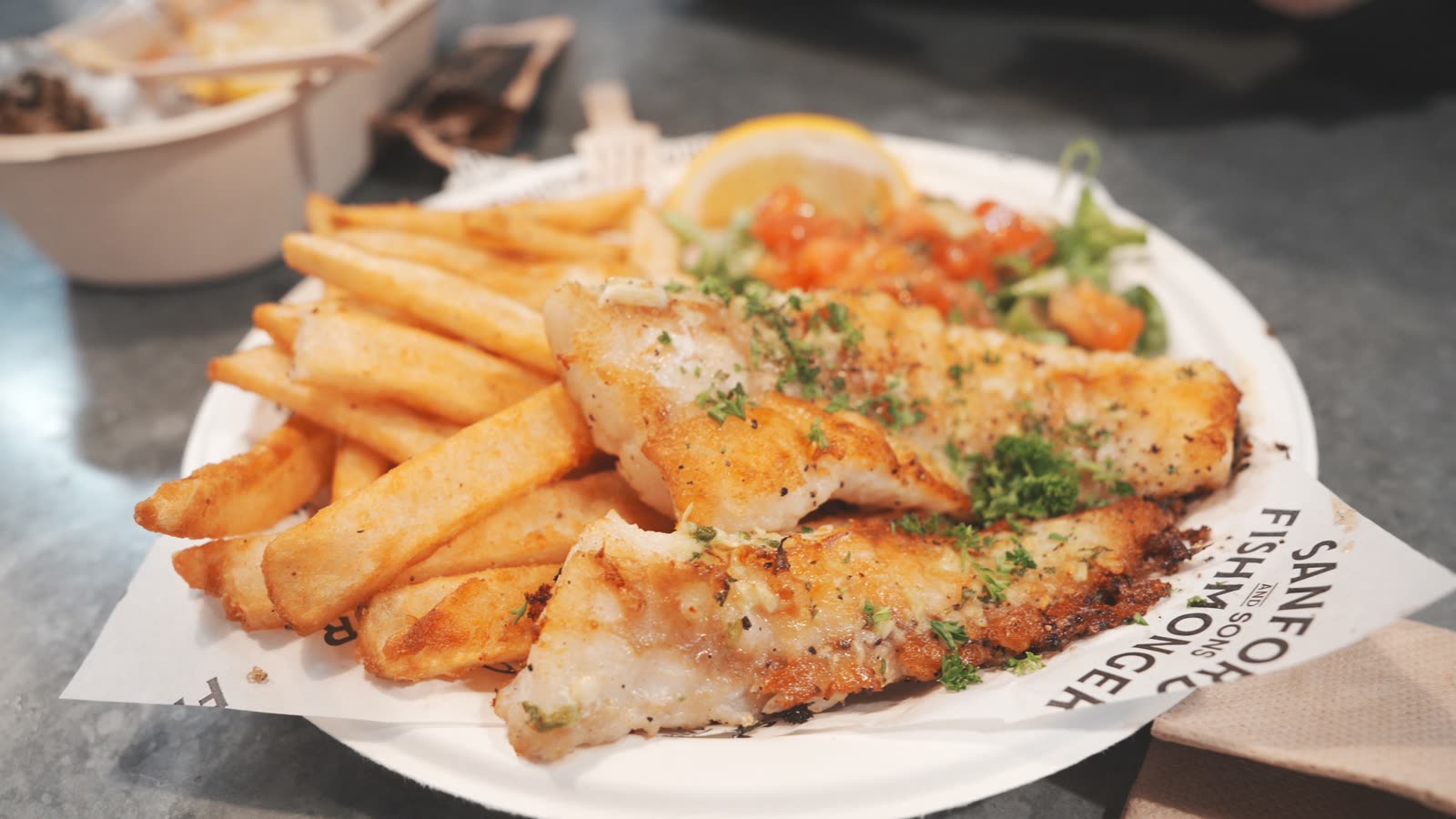 Garlic-brushed fried monkfish with chips, salad, and aioli from Sanford & Sons Fishmonger at the Auckland Fish Market