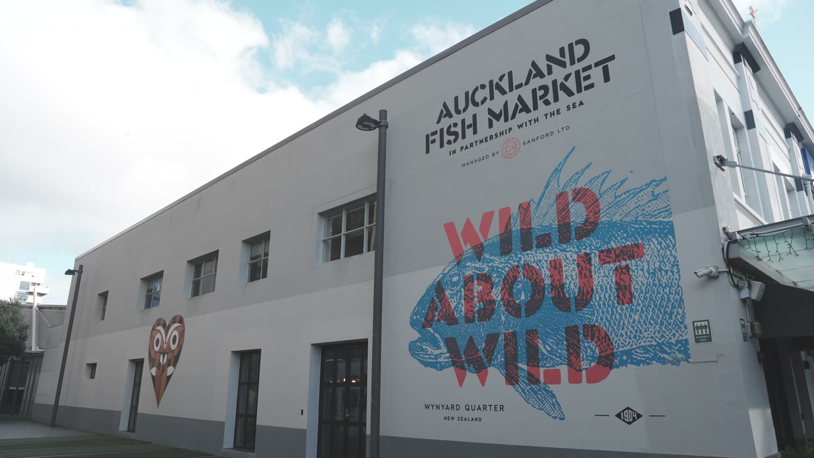 The Auckland Fish Market building in Wynyard Quarter with a Wild About Wild mural