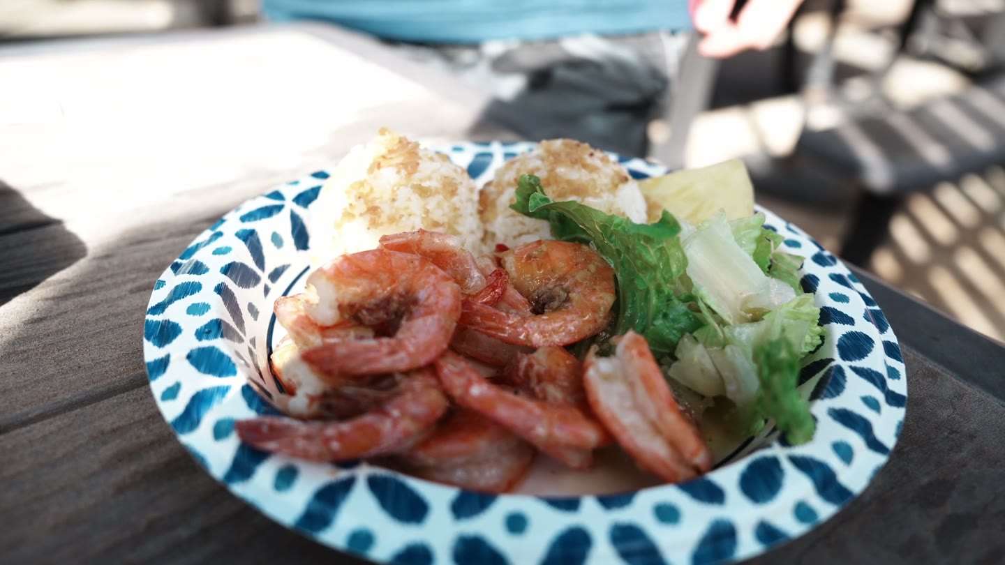Butter-garlic shrimp and garlic-soaked rice at Jenny's in Haleʻiwa.