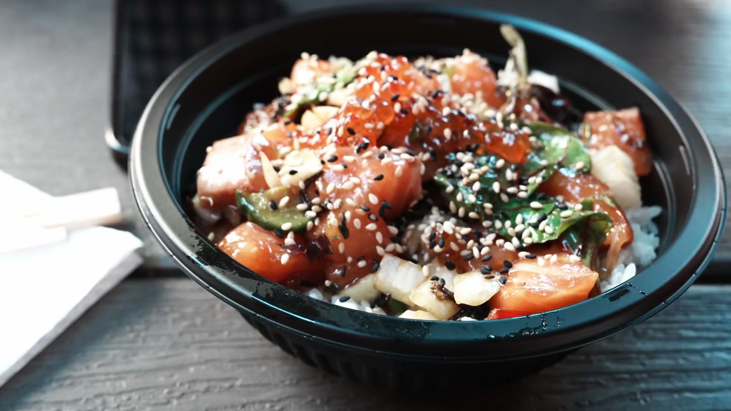 A made-to-order poke bowl at Maguro Spot in Waikīkī.